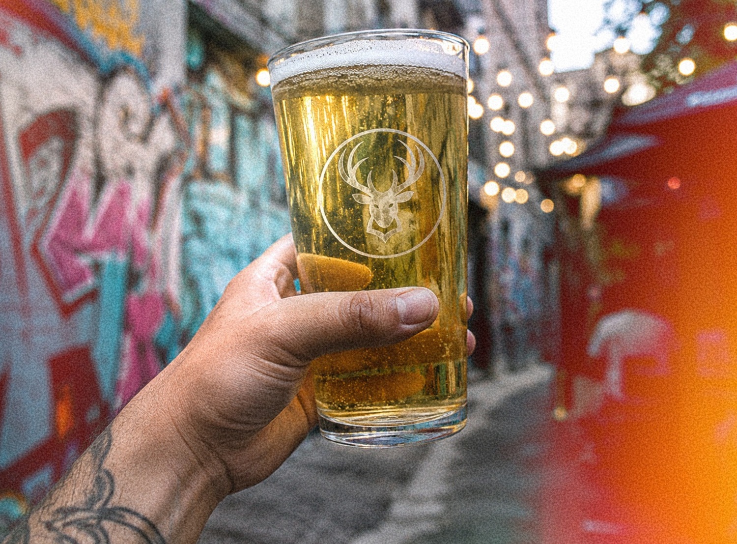My Ultimate Bucks beer glass in a Melbourne graffiti laneway