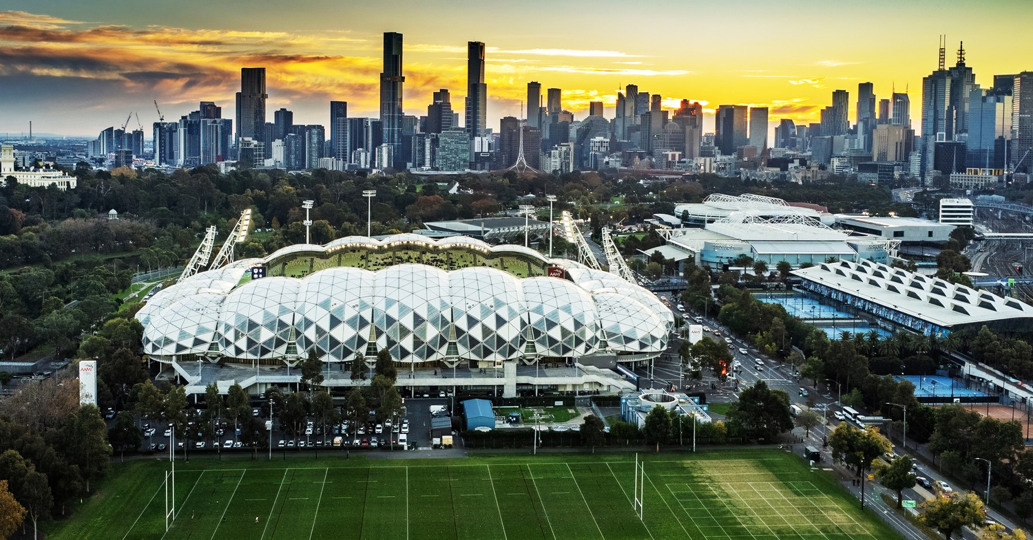 Melbourne sports precinct and stadium skyline at sunset