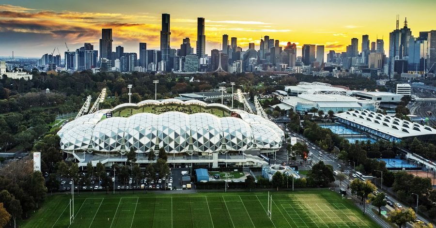 Melbourne sports precinct and stadium skyline at sunset