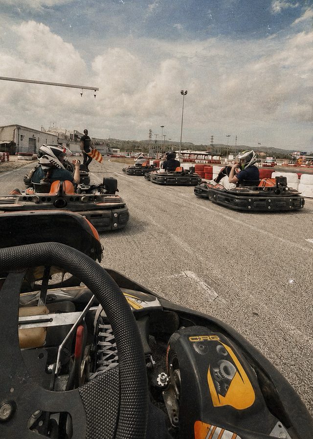 The view from a go-kart seat across the grid