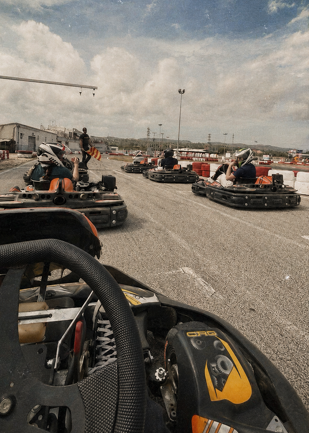 Go karts lined up on the grid at a bucks go karting session