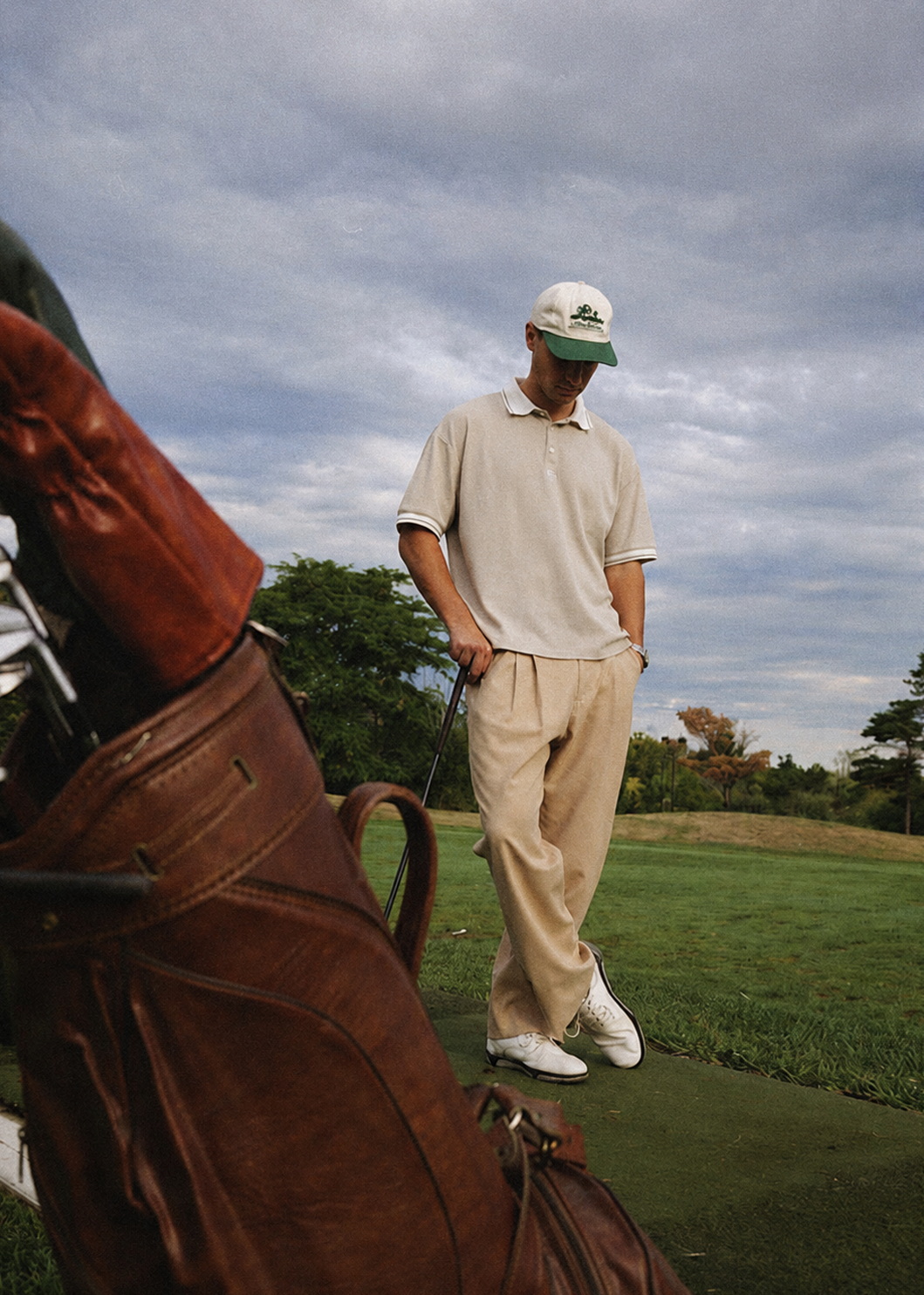 A buck on the course during a golf day