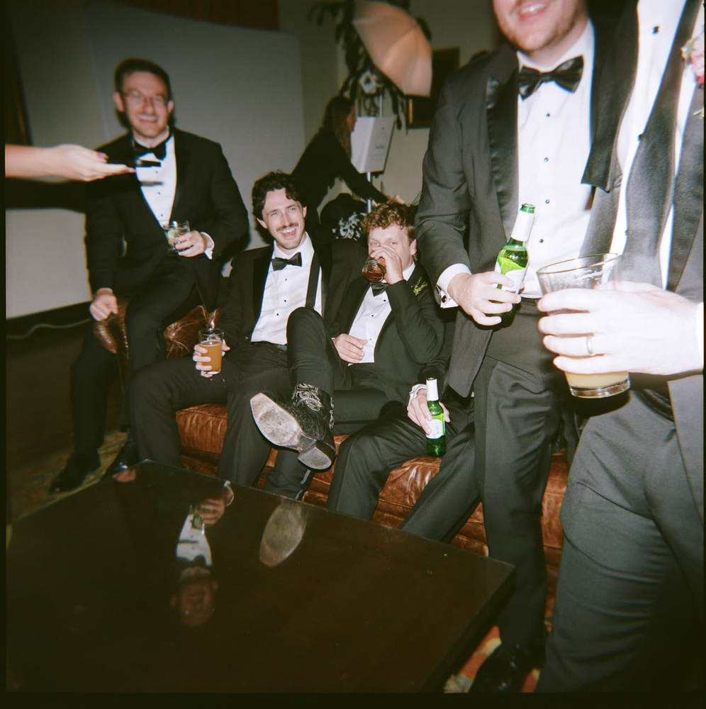 A group of mates at a whisky and spirits tasting during a Melbourne bucks party