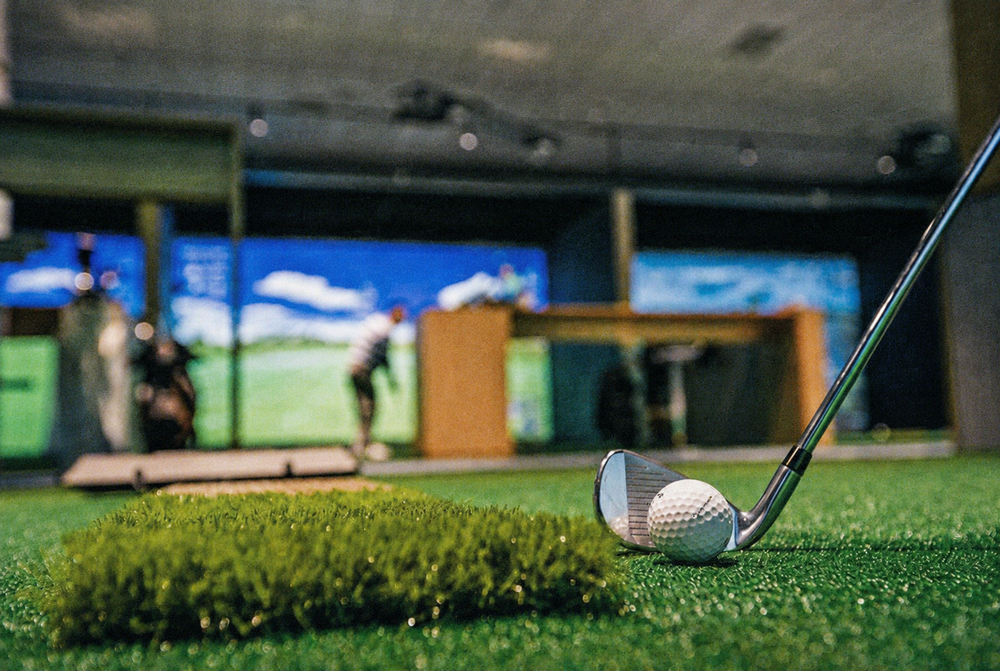 A group playing golf as part of a Melbourne bucks party package
