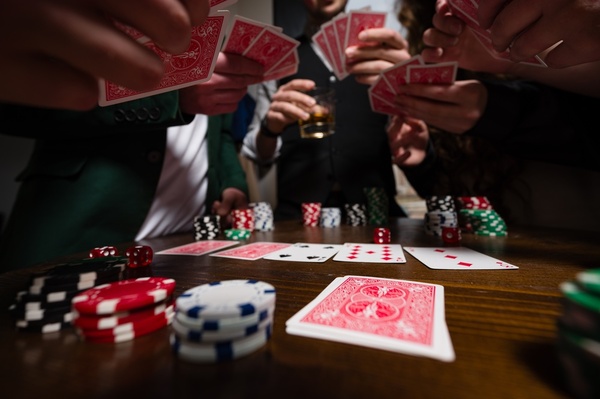 Cards and chips across a poker table