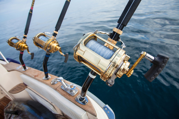 Deep-sea fishing reels on the back of a boat