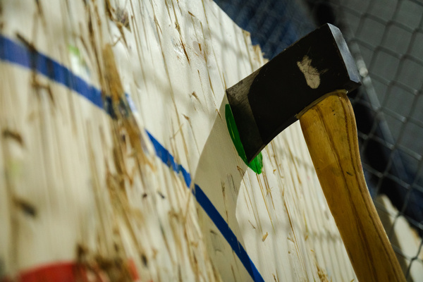 An axe buried in the target board