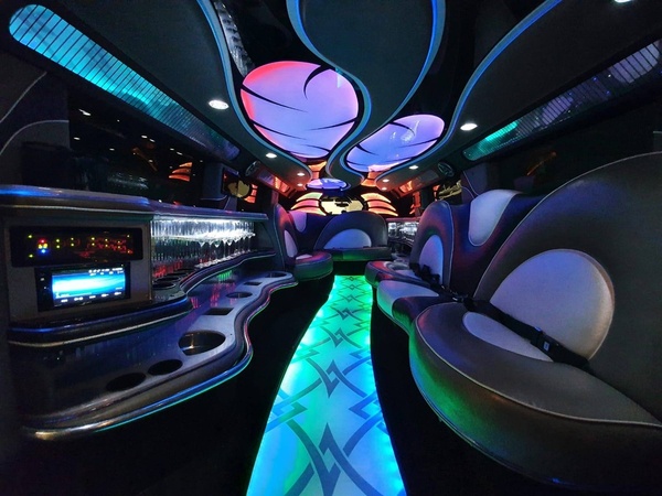 The neon-lit interior of a stretch limo