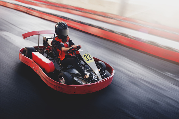A go-kart speeding round the track