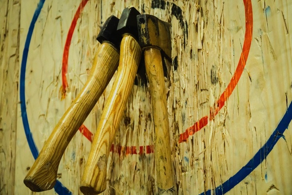 Two axes buried in a painted target
